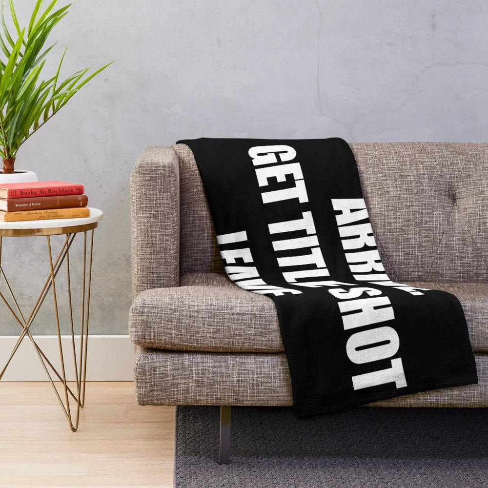 Cozy plush blanket with the text "ARRIVE GET TITLE SHOT LEAVE" in a bold, motivational design
