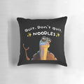 Kung Fu Panda Oogway quote "Quit. Don't quit. Noodles." printed on a plush, decorative pillow