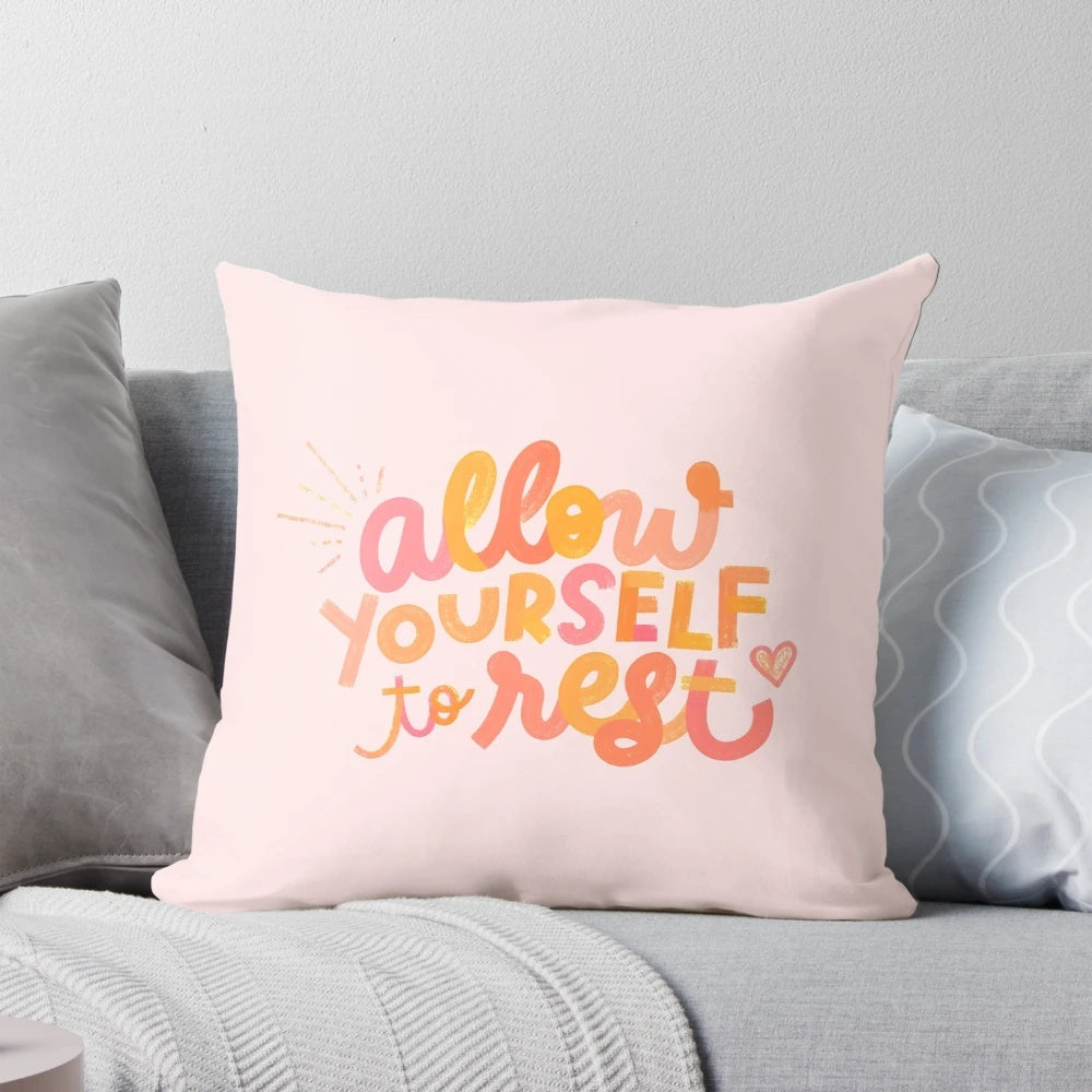 Bright, neon-colored 'Rest Pillow' with inspirational quote for home and bedroom decor