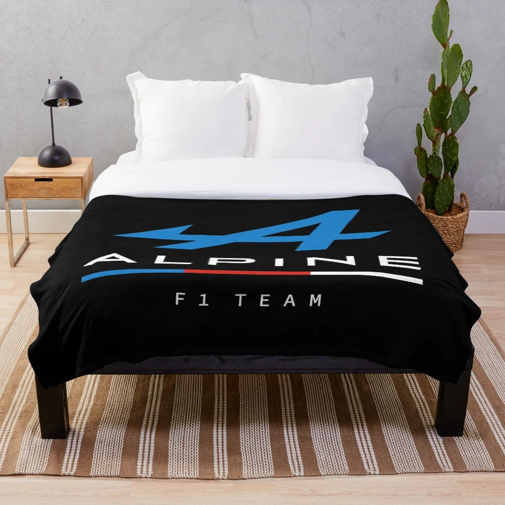 Motorsports-inspired plush blanket featuring a racing team design