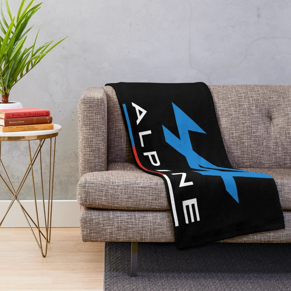 Motorsports-inspired plush blanket featuring a racing team design