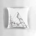 Mountain pillow featuring a landscape of pine trees and a majestic mountain range