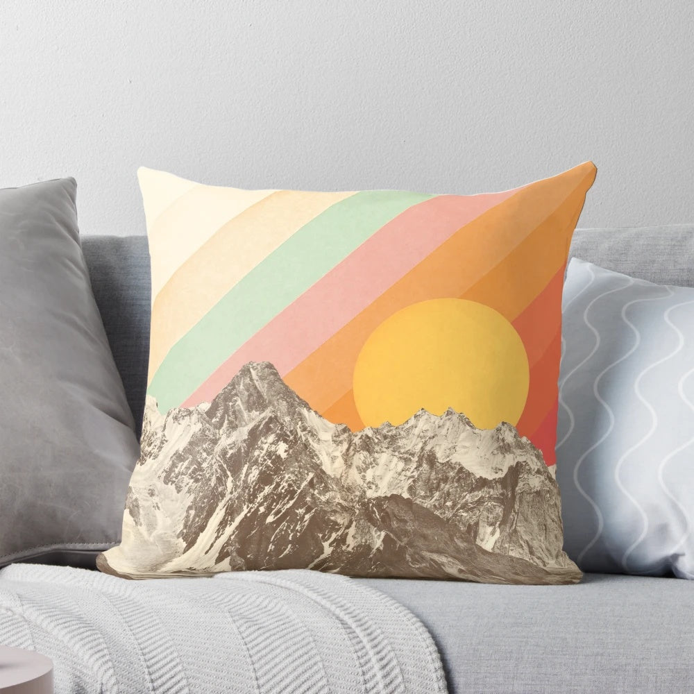 Vibrant mountainscape graphic design on a cozy decorative pillow