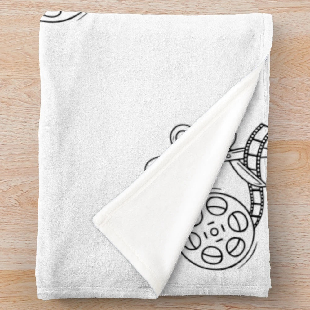 Movie reel with scissors cutting the film tape plush blanket