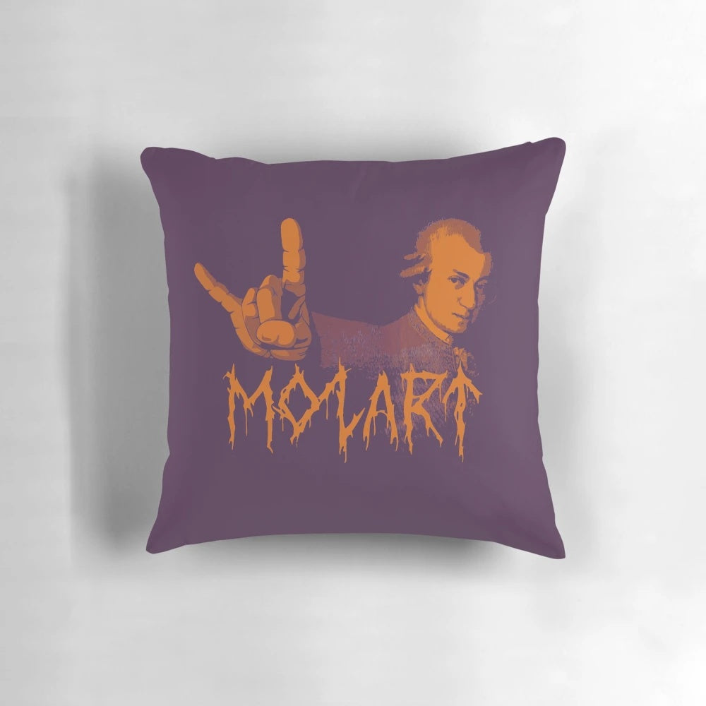 A black and white pillow featuring the image of classical composer Wolfgang Amadeus Mozart with a heavy metal flair.
