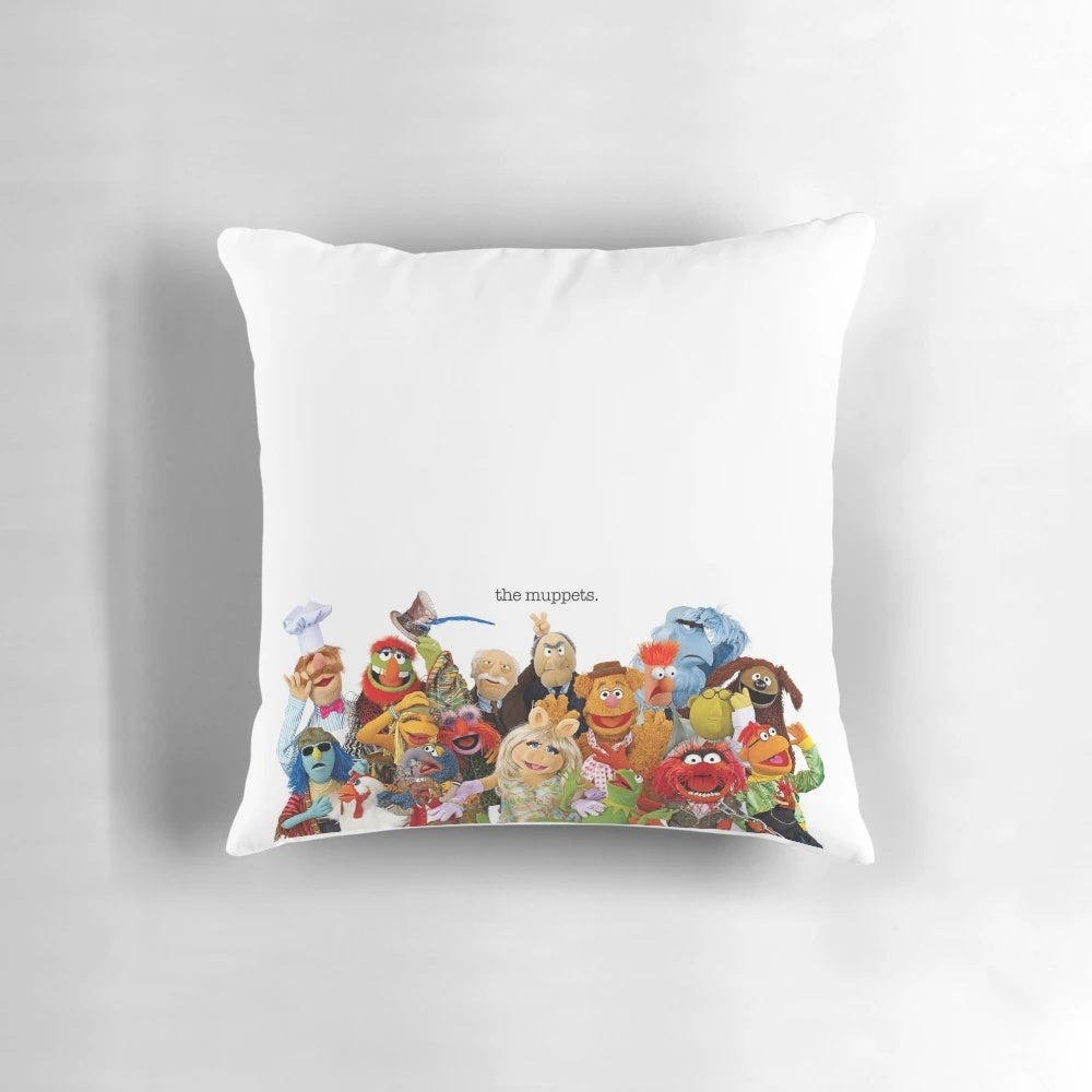 Muppets-inspired decorative pillow featuring colorful Muppet characters