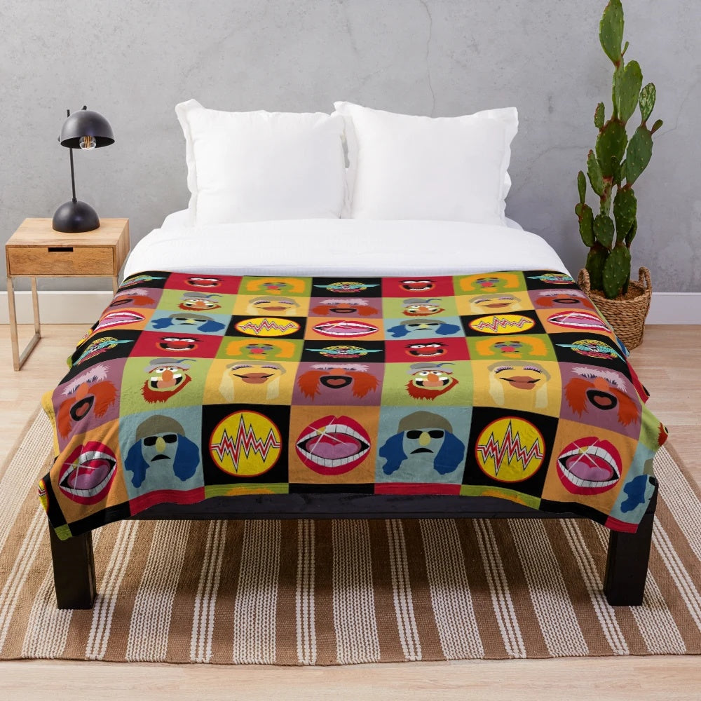 Muppets plush blanket with characters from the Electric Mayhem band