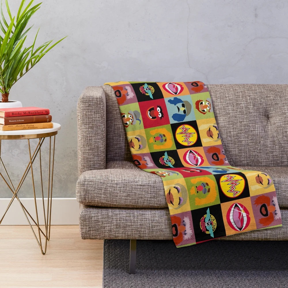 Muppets plush blanket with characters from the Electric Mayhem band