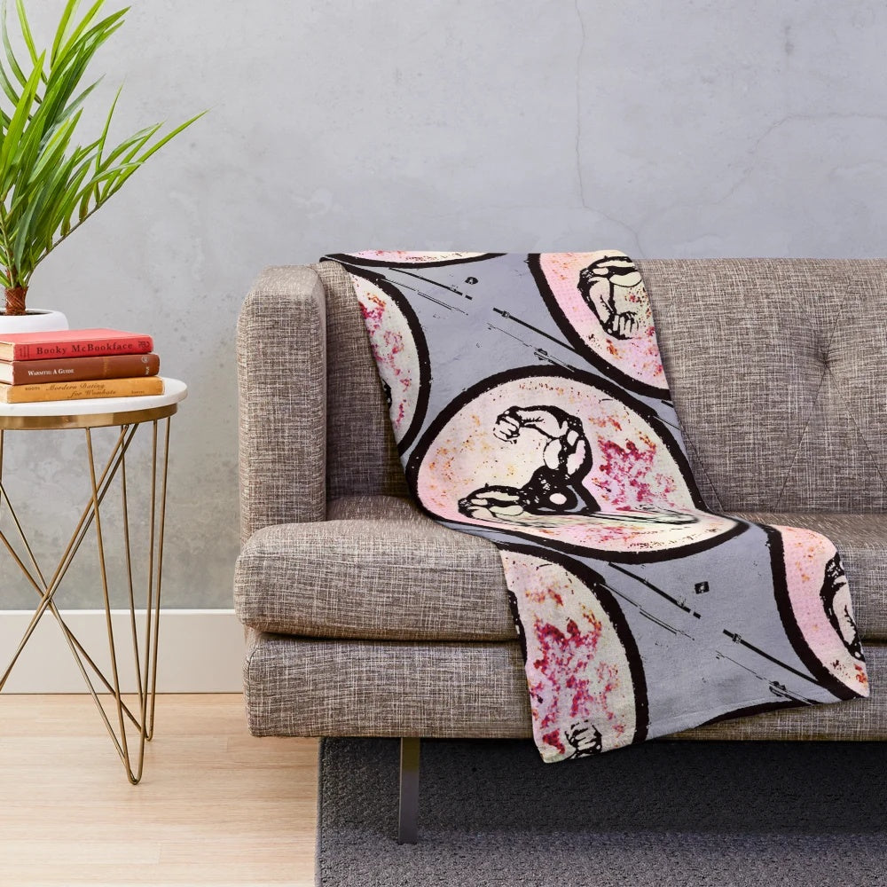 A plush blanket featuring a muscular design for music and fitness enthusiasts