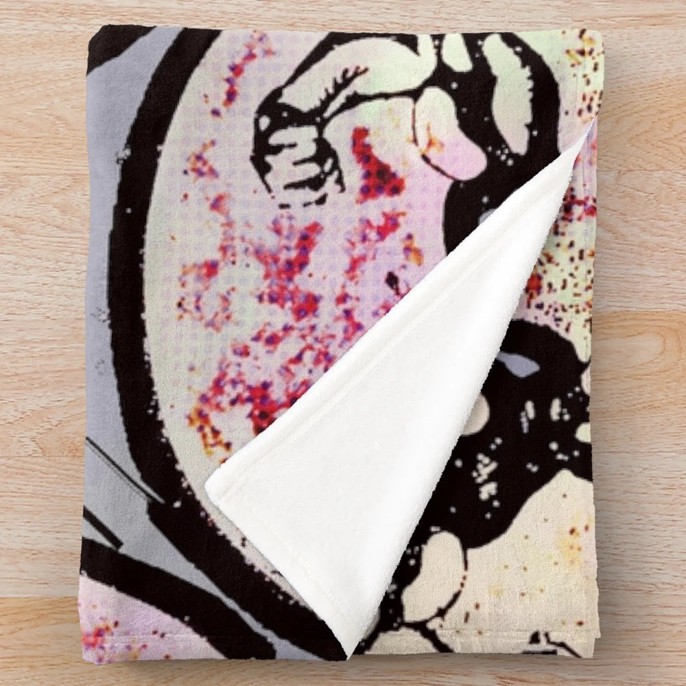 A plush blanket featuring a muscular design for music and fitness enthusiasts
