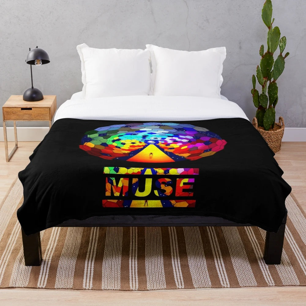 Muse-inspired plush blanket featuring a bird design and the word "simplicity