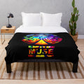 Muse-inspired plush blanket featuring a bird design and the word "simplicity