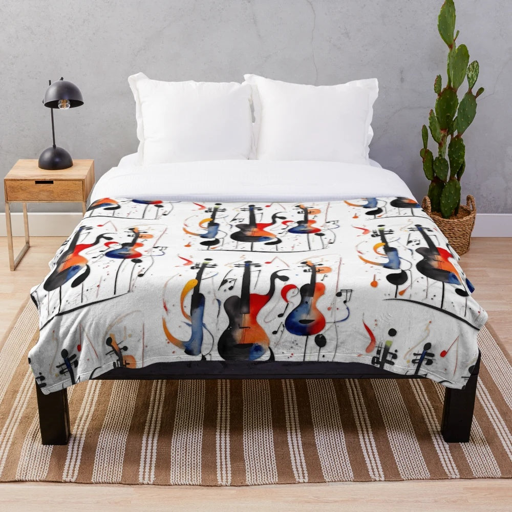 Plush blanket featuring a music-inspired graphic design with guitars