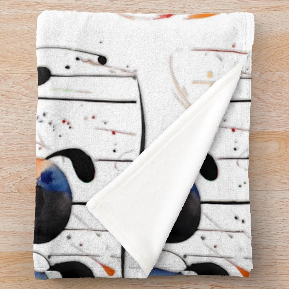 Plush blanket featuring a music-inspired graphic design with guitars