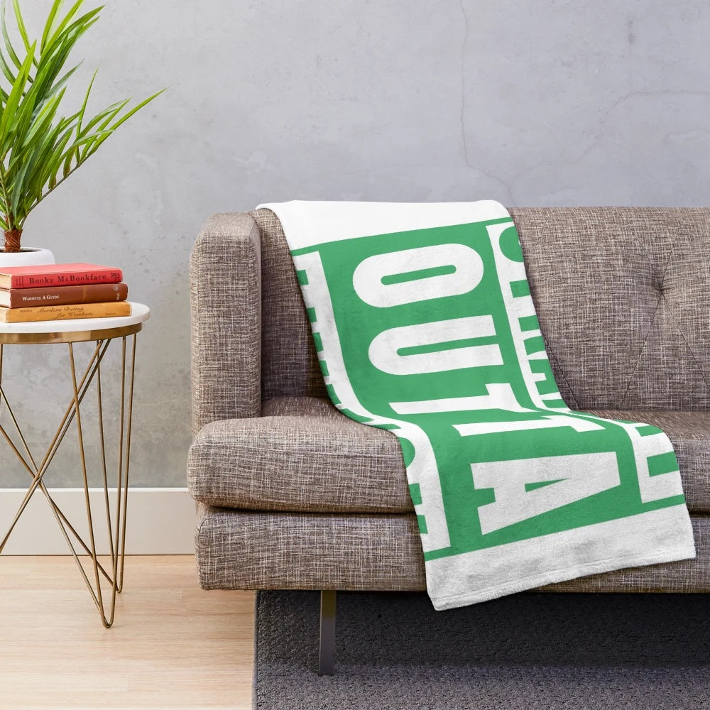 Plush green blanket with "Straight Outta Limerick" design