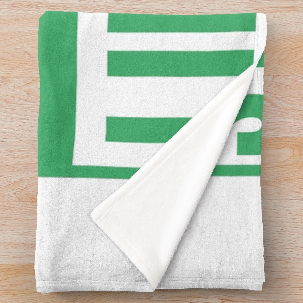 Plush green blanket with "Straight Outta Limerick" design