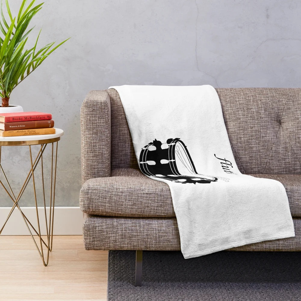 Plush blanket with a music instrument design
