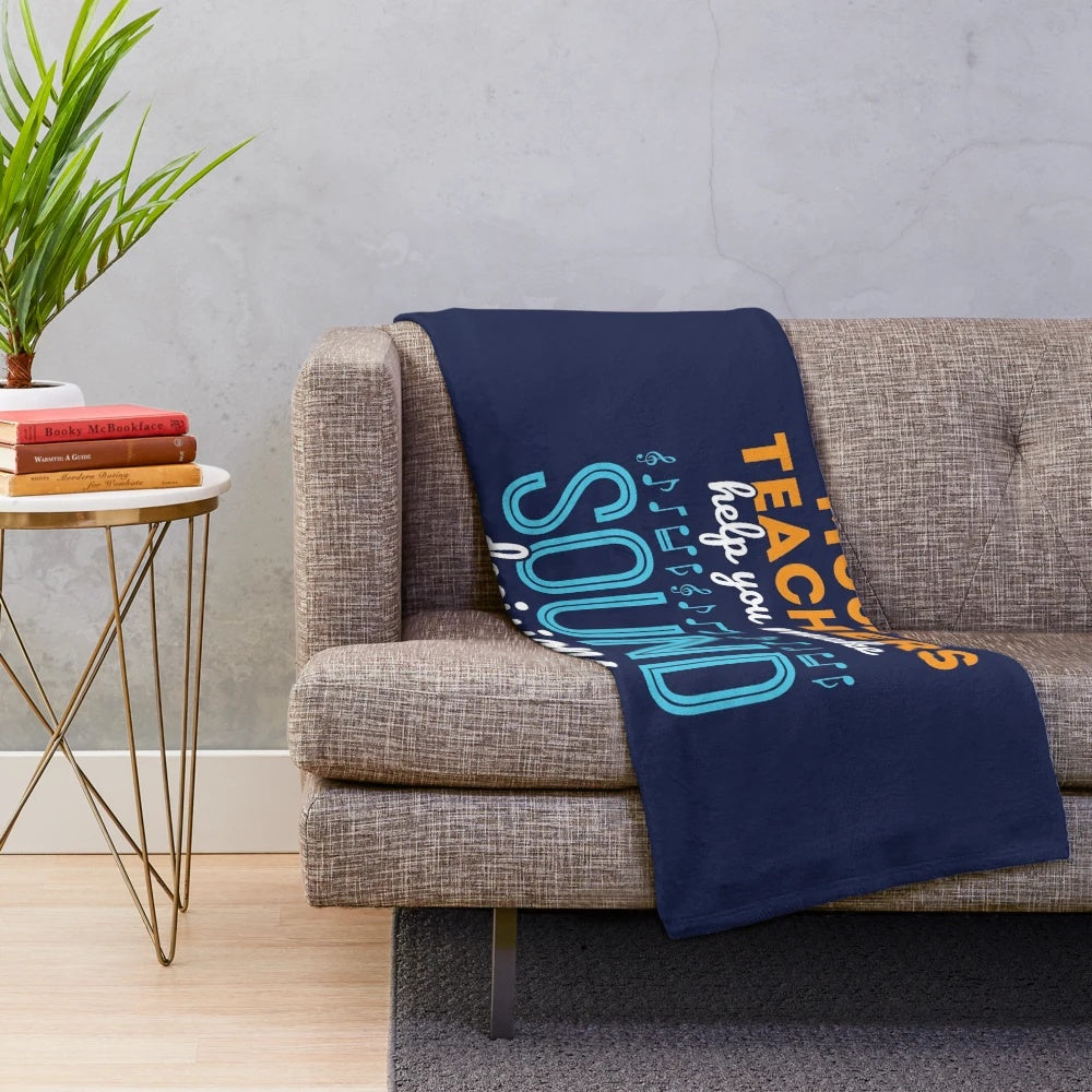 Music teacher-themed plush blanket with a pun about making sound decisions