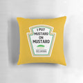 A vibrant yellow pillow with the word "mustard" printed on it, representing the love for this popular condiment.