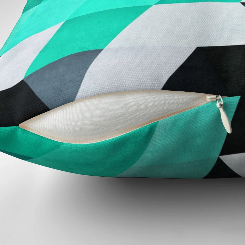 Mynt 142 abstract geometric throw pillow with teal, white, and black colors