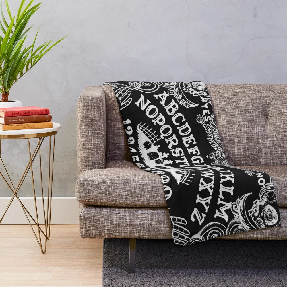 Black witch board plush blanket with occult and supernatural design