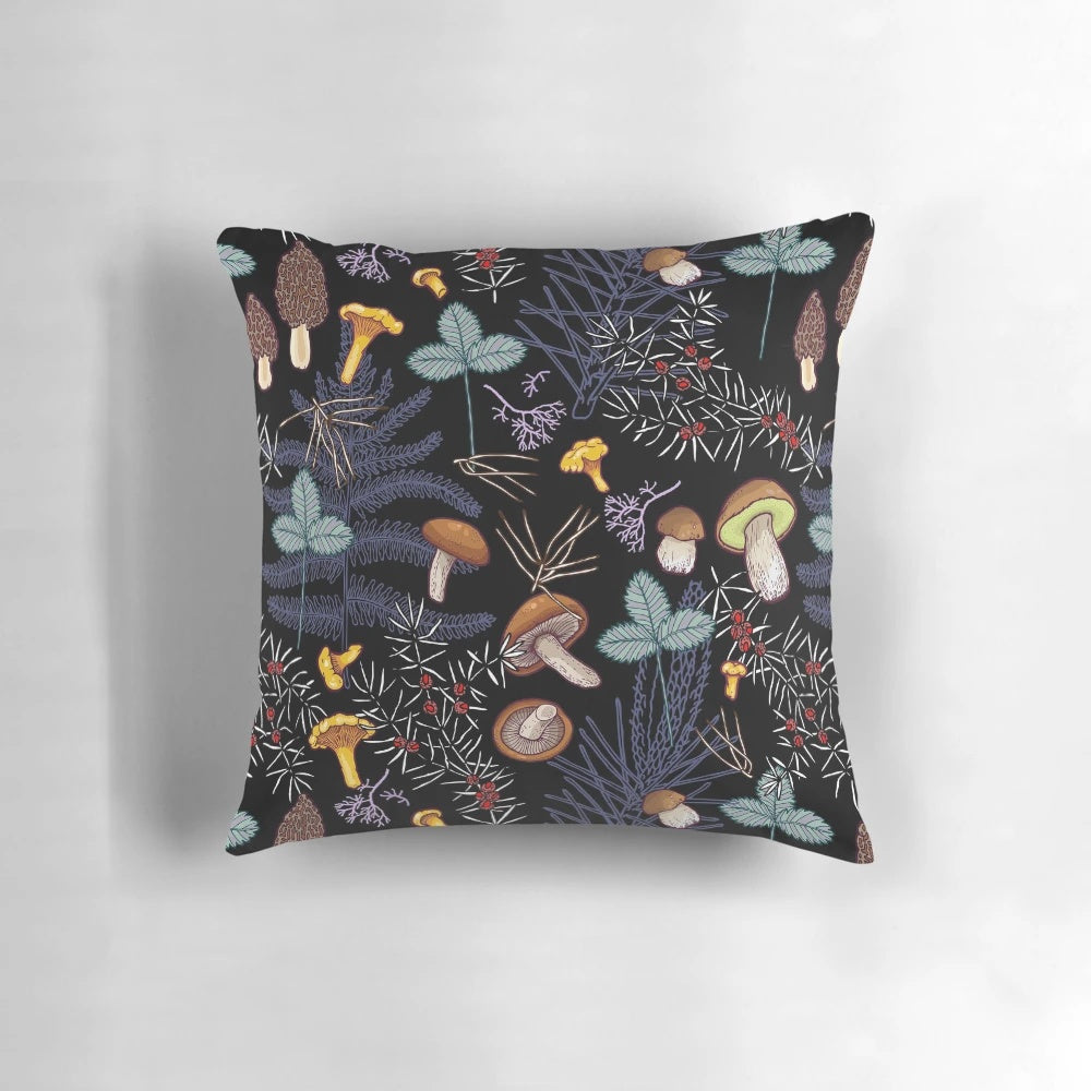 A pillow featuring a pattern of dark, wild forest mushrooms