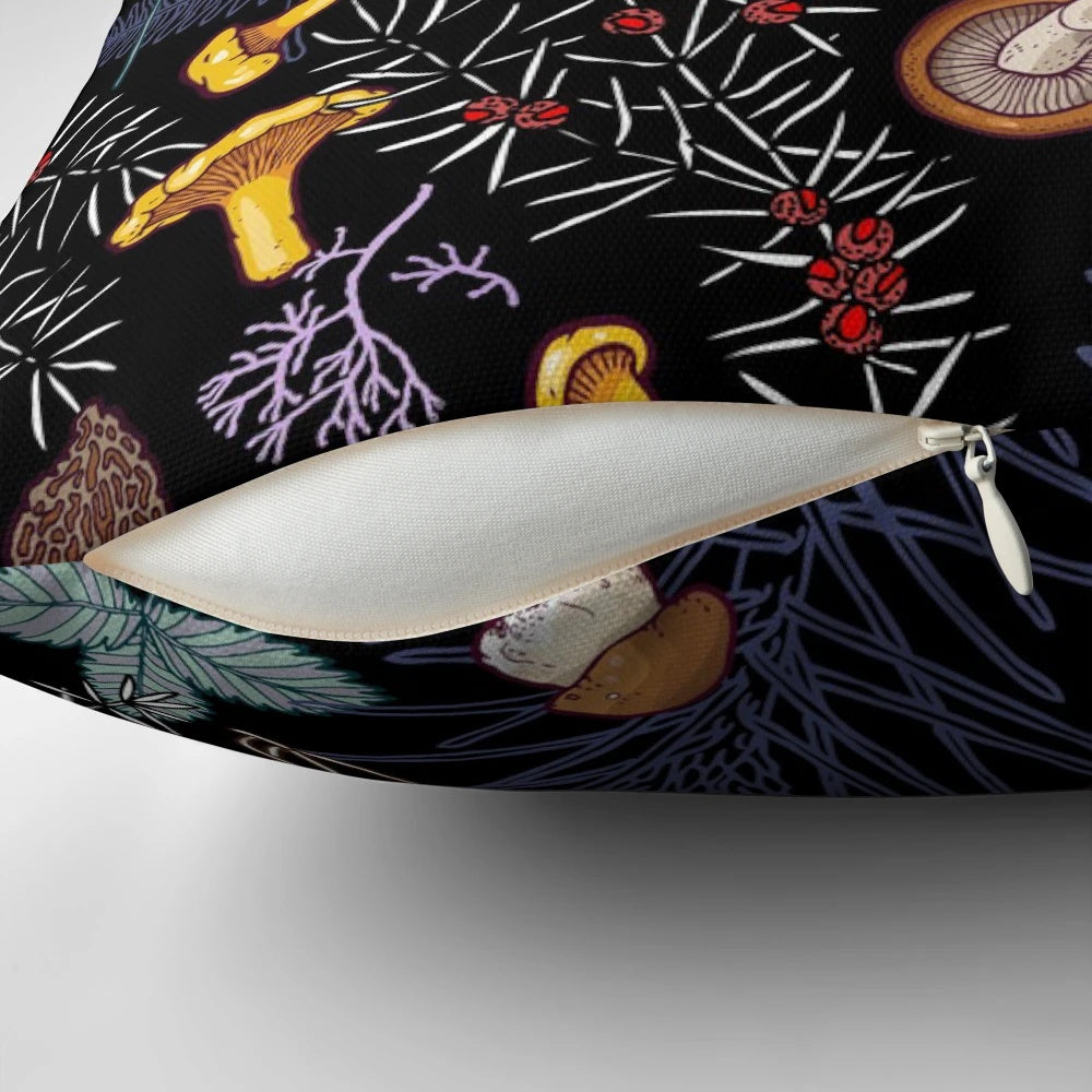 A pillow featuring a pattern of dark, wild forest mushrooms