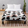 Mothman-inspired plush blanket in black, white, and red