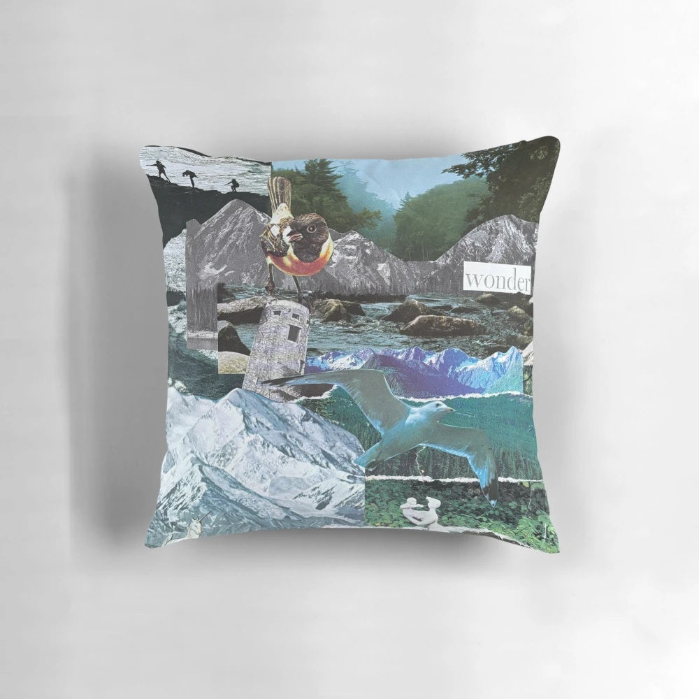 Decorative pillow featuring a collage of misty Pacific Northwest nature scenes including mountains, a tower, birds, and a statue or unicorn-like figure.