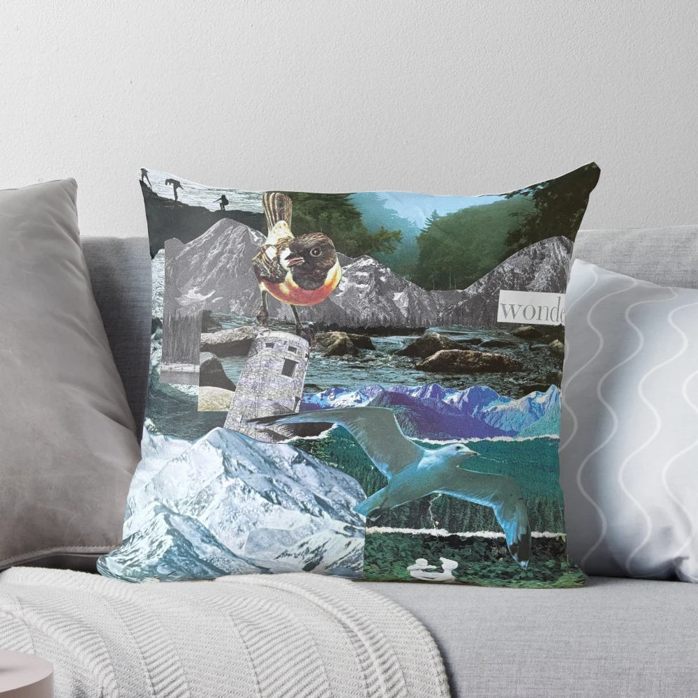 Decorative pillow featuring a collage of misty Pacific Northwest nature scenes including mountains, a tower, birds, and a statue or unicorn-like figure.