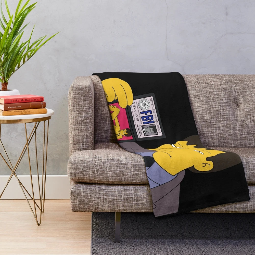 Plush blanket featuring an X-Files inspired design with Fox Mulder