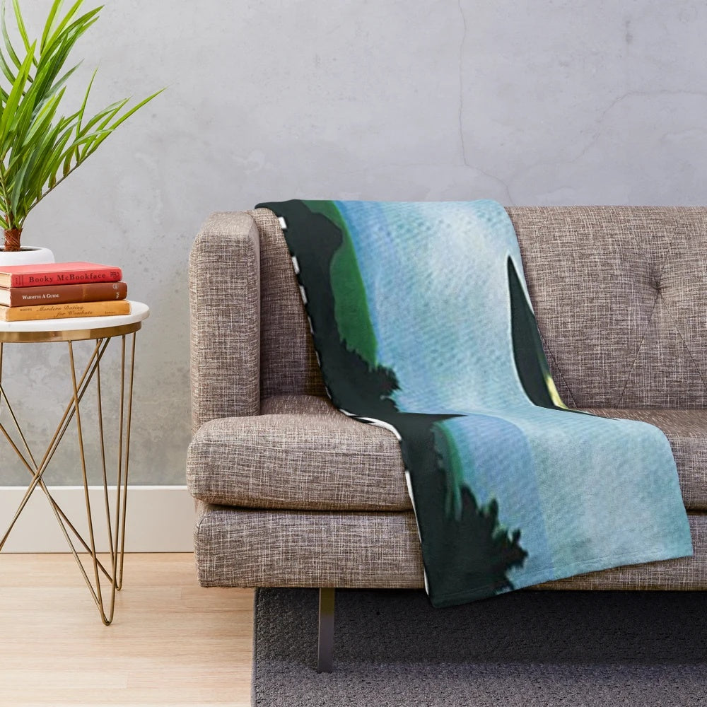 X-Files inspired plush blanket with UFO and alien graphic