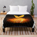 Plush blanket featuring a phoenix rising from flames, a mythological bird of hope and rebirth