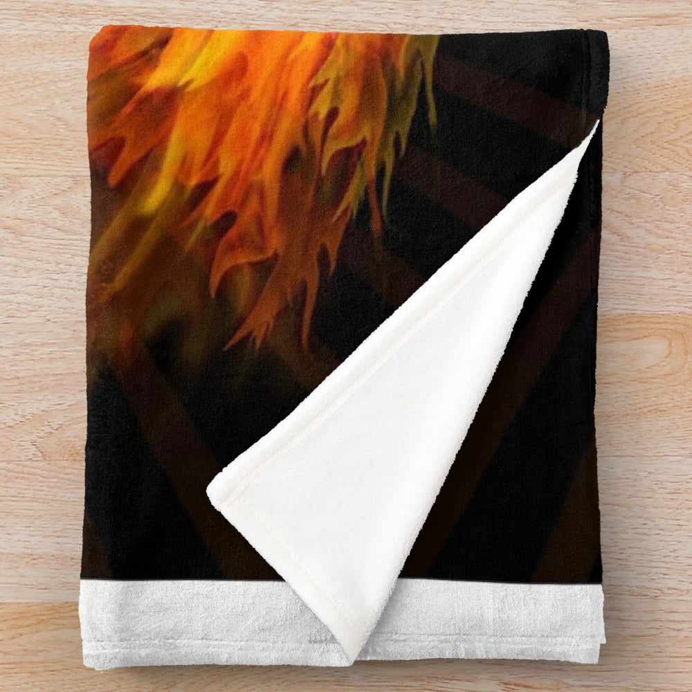 Plush blanket featuring a phoenix rising from flames, a mythological bird of hope and rebirth