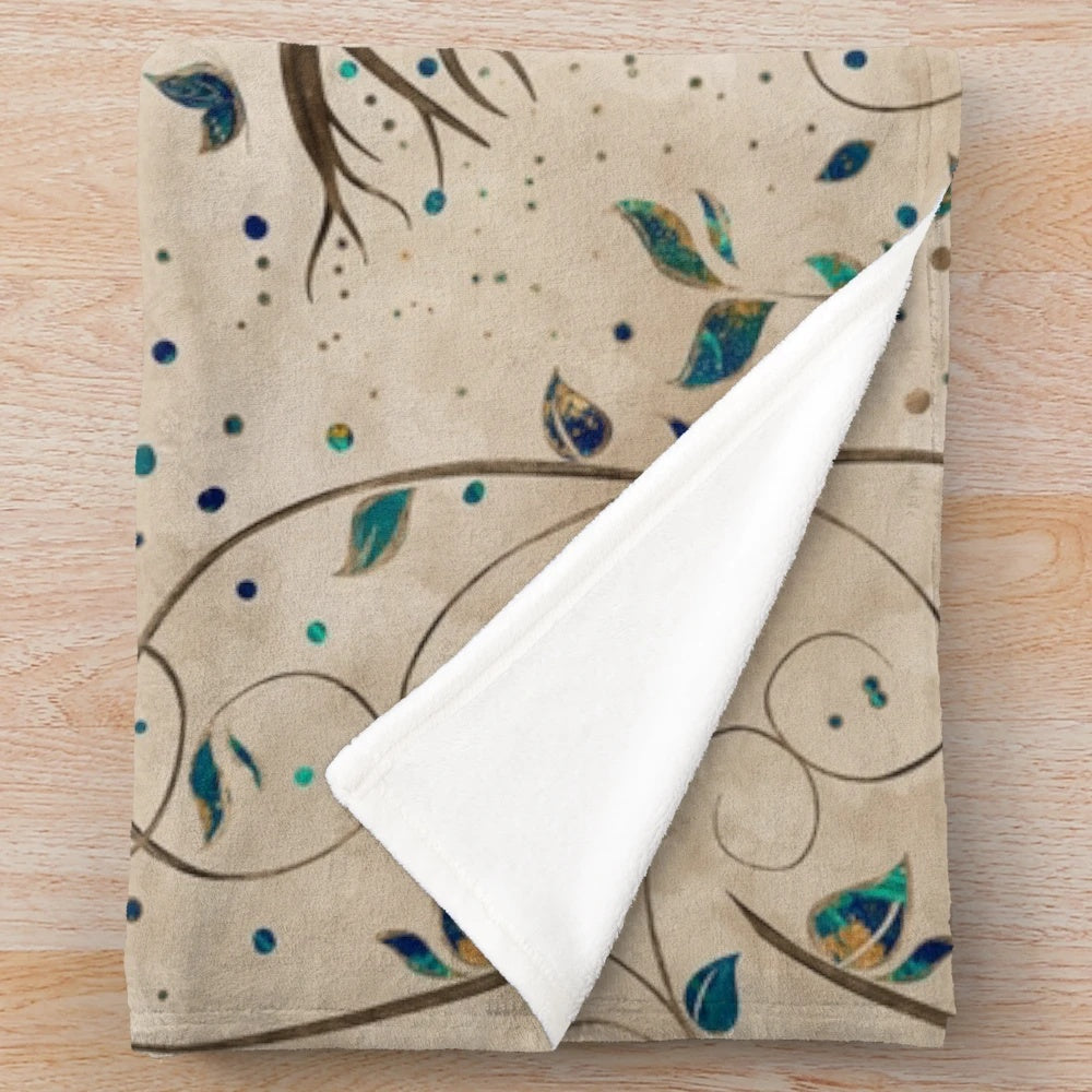 Yggdrasil, the mystic tree of life, depicted on a cozy plush blanket with birds, butterflies, and golden leaves.