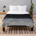 Plush "After We Die" blanket featuring a moonscape landscape with stars and clouds