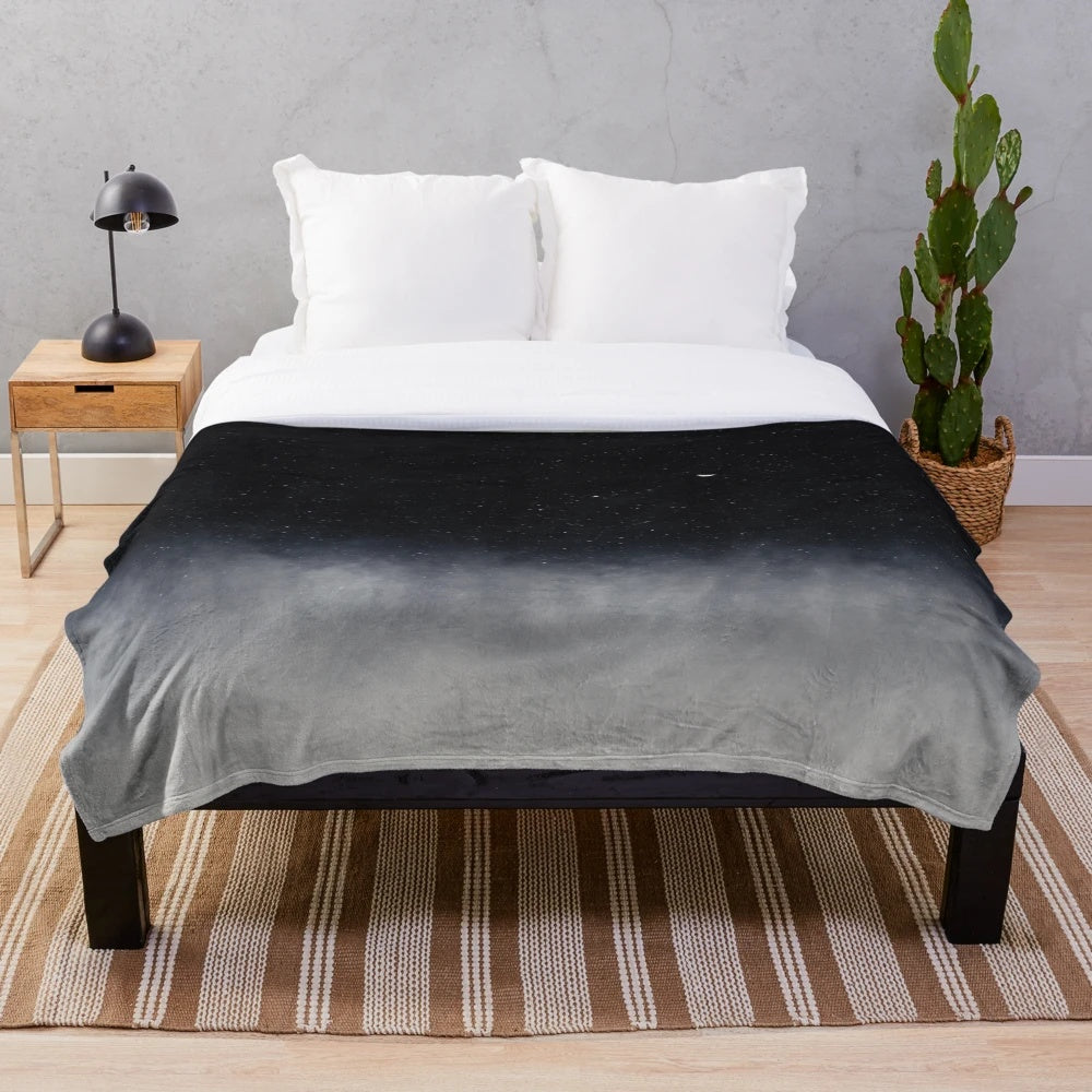 Plush "After We Die" blanket featuring a moonscape landscape with stars and clouds