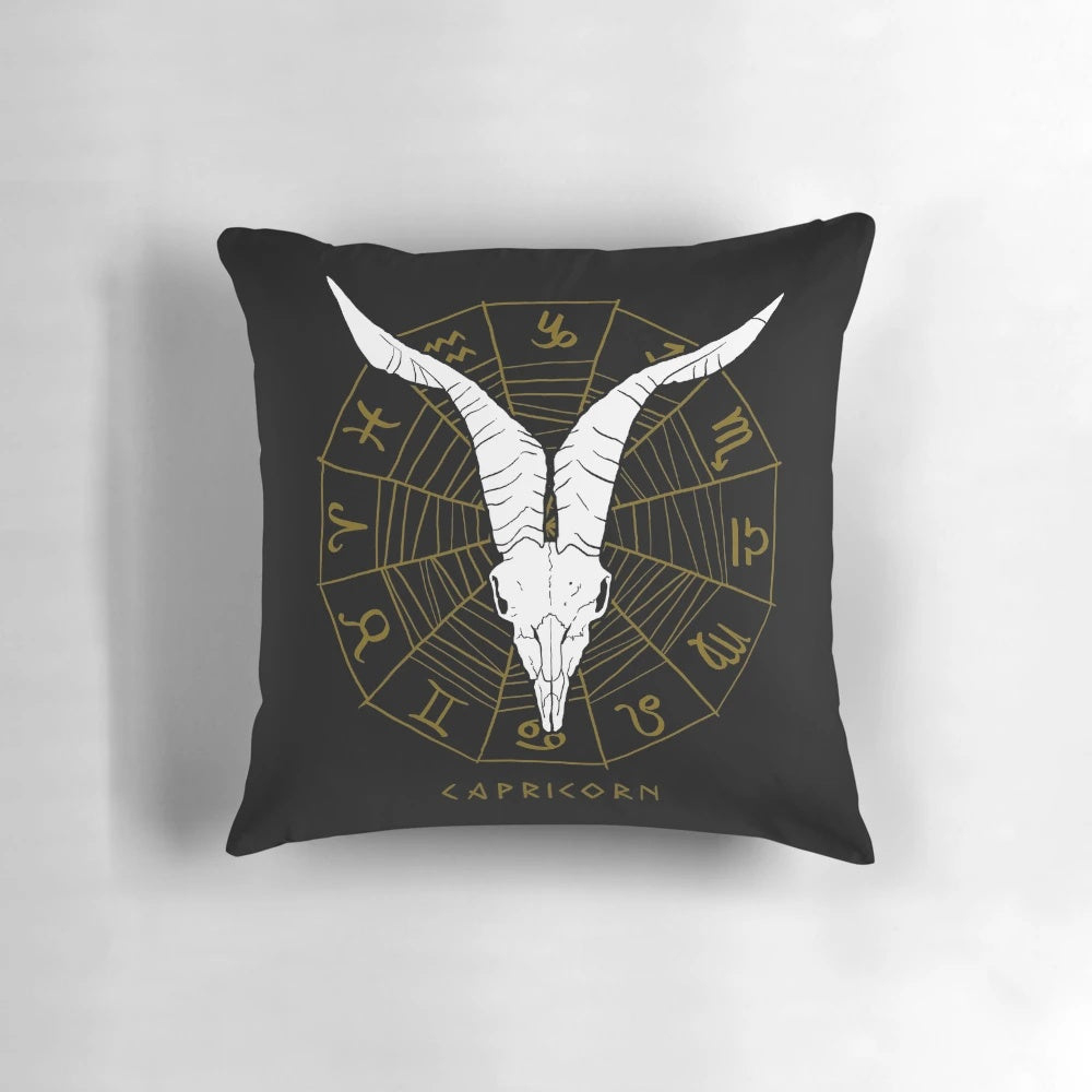 Capricorn zodiac pillow featuring a goat skull design for a spooky, macabre look
