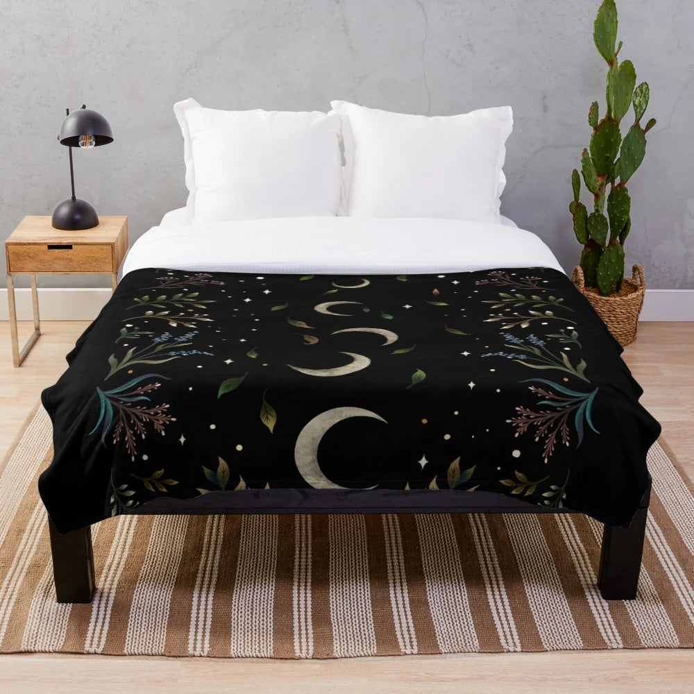 Crescent moon plush blanket with botanical floral design