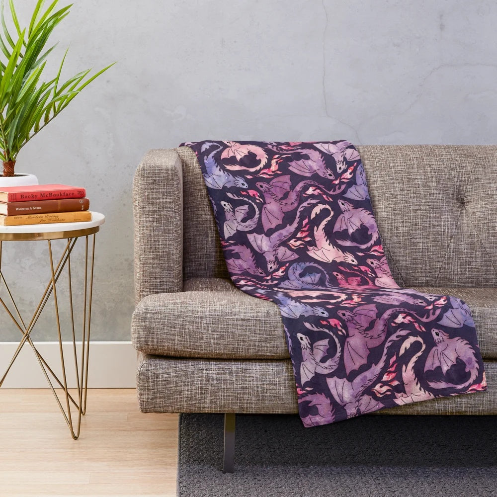 Plush dragon-themed blanket with a seamless watercolor design in dark pink and purple hues