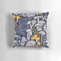 Pillow with a midnight blue background featuring ivory, pale blue, and yellow wild mushrooms in a botanical, vintage-inspired pattern.