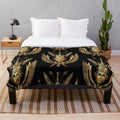 Plush blanket featuring a design blending Egyptian and Mayan god imagery