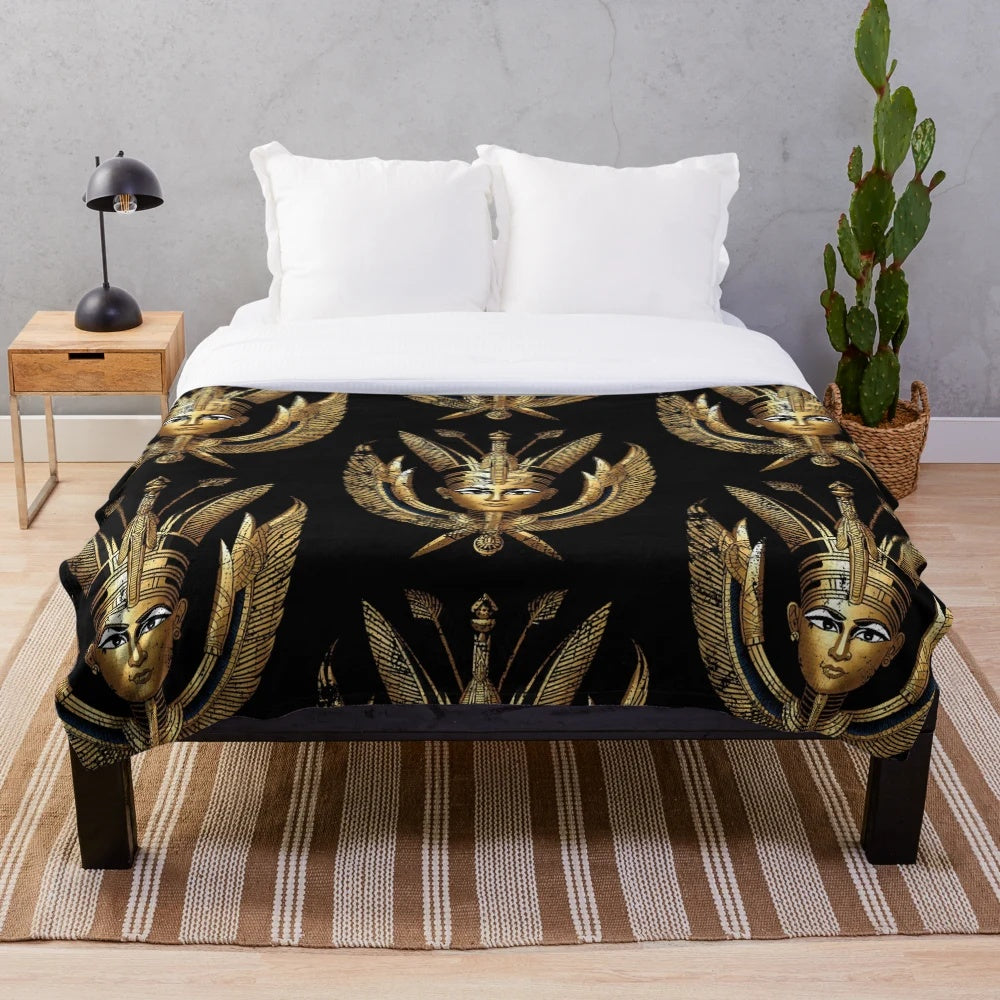 Plush blanket featuring a design blending Egyptian and Mayan god imagery