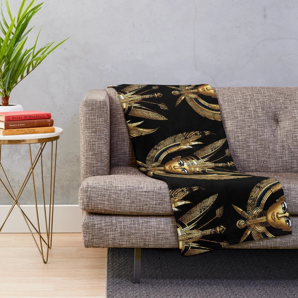 Plush blanket featuring a design blending Egyptian and Mayan god imagery
