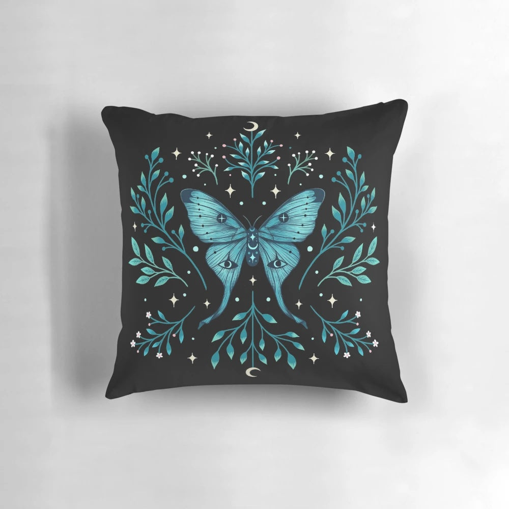 Turquoise pillow with a mystical luna moth design, featuring botanical elements for a boho, witchy vibe.