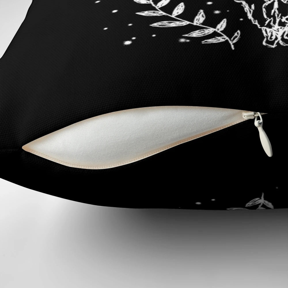 A decorative throw pillow featuring a moon phases, snakes, and crystals witchy design.