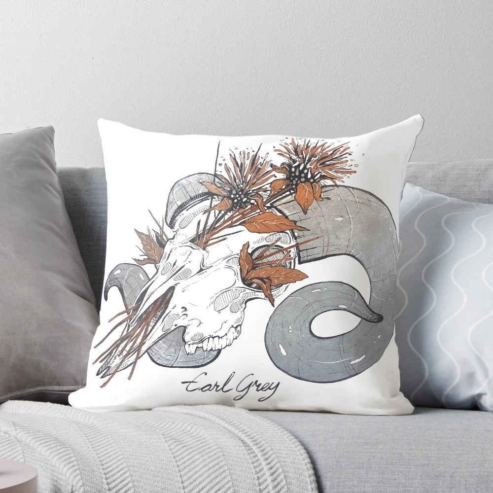 A cozy pillow with a ram skull design, perfect for witchy home decor.