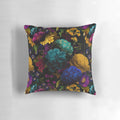 A black and white throw pillow featuring a mystical, botanical night garden pattern.