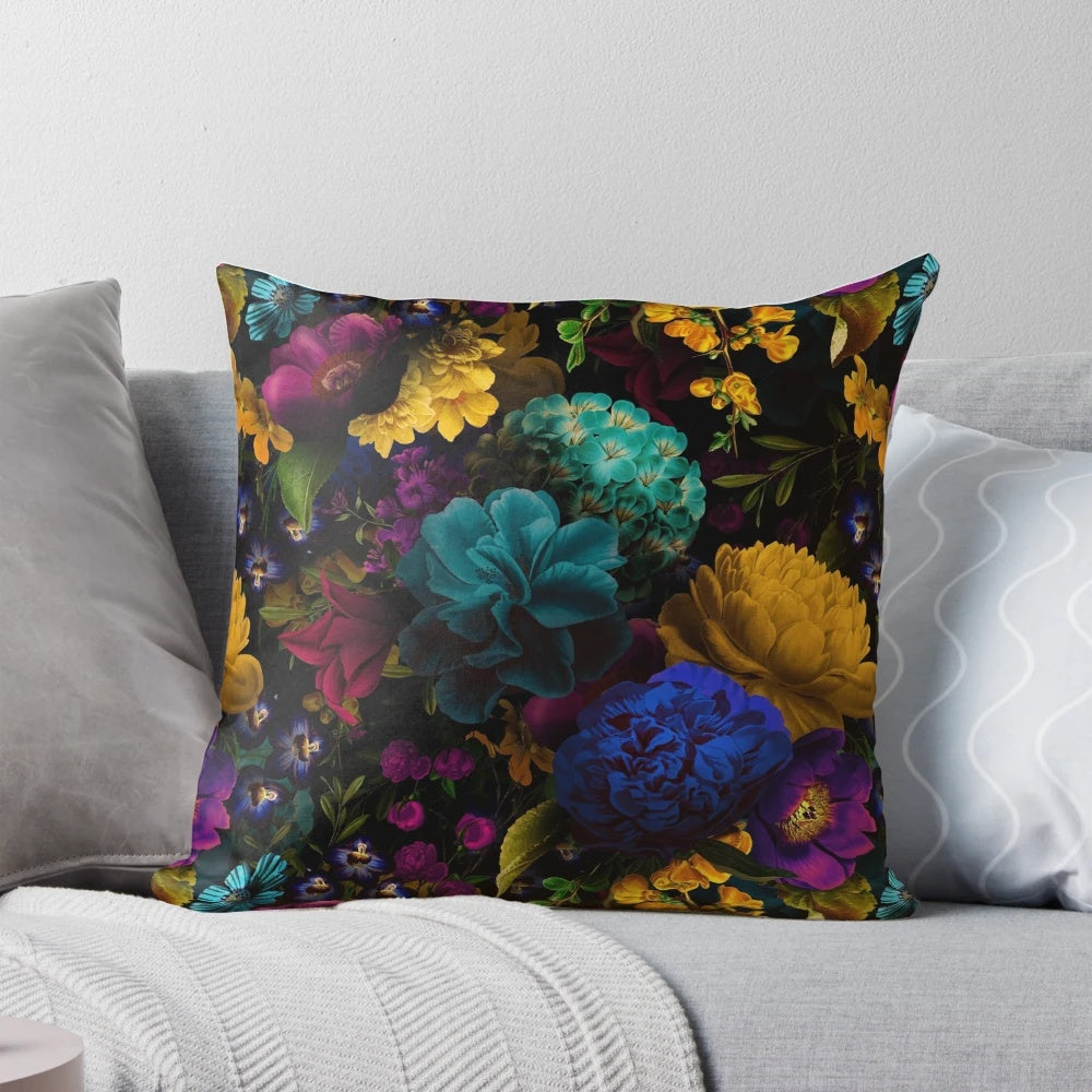 A black and white throw pillow featuring a mystical, botanical night garden pattern.