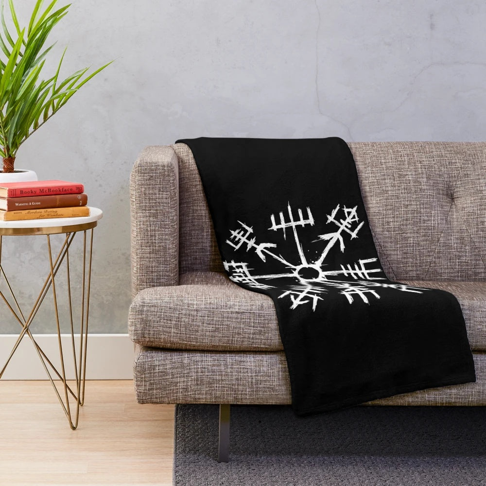 Cozy plush blanket featuring a Viking compass or Vegvisir design inspired by Norse mythology and ancient Icelandic runes.